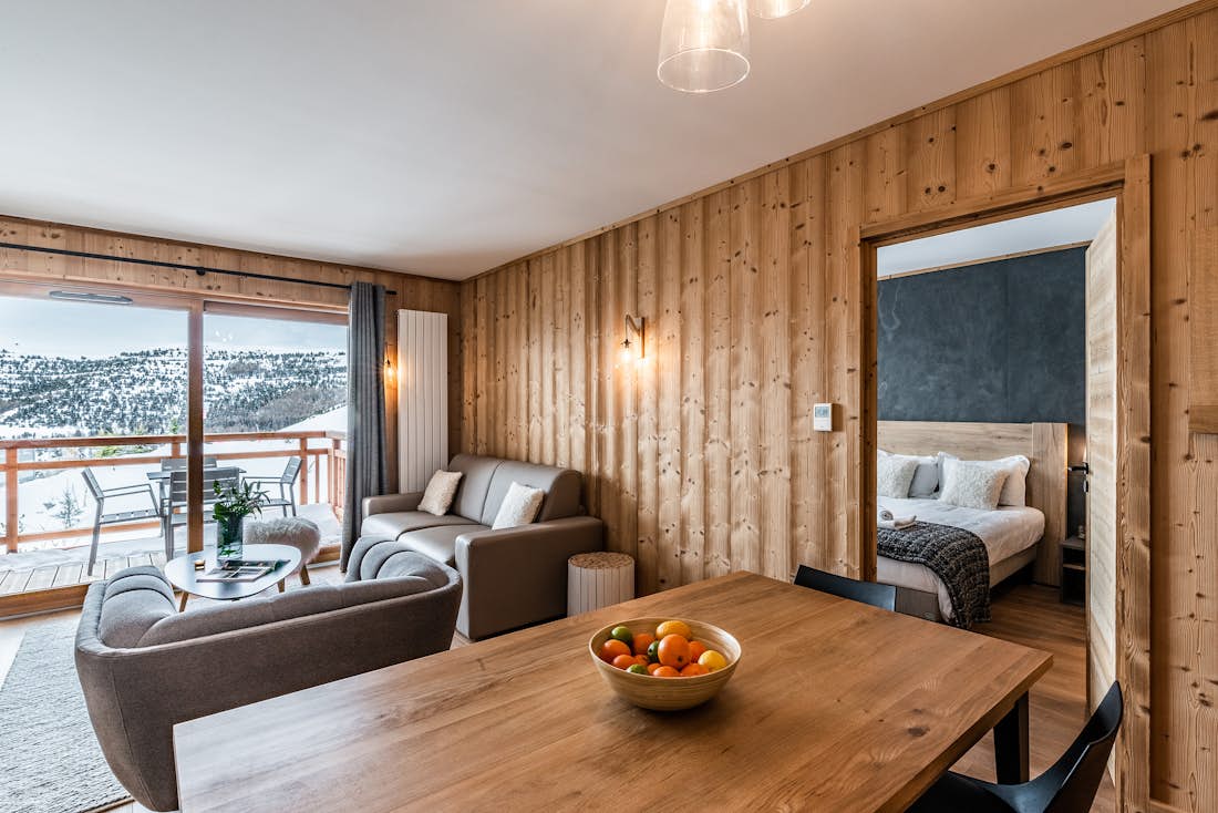 Alpe d’Huez location - Appartement Thuja - Un salon moderne dans appartement de luxe Thuja aux pieds des pistes à Alpe d'Huez