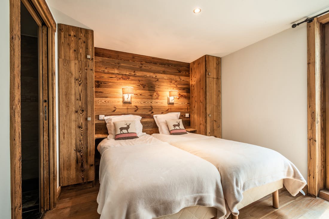 Splendide chambre lits simples convertibles appartement au ski Moabi Courchevel Le Praz