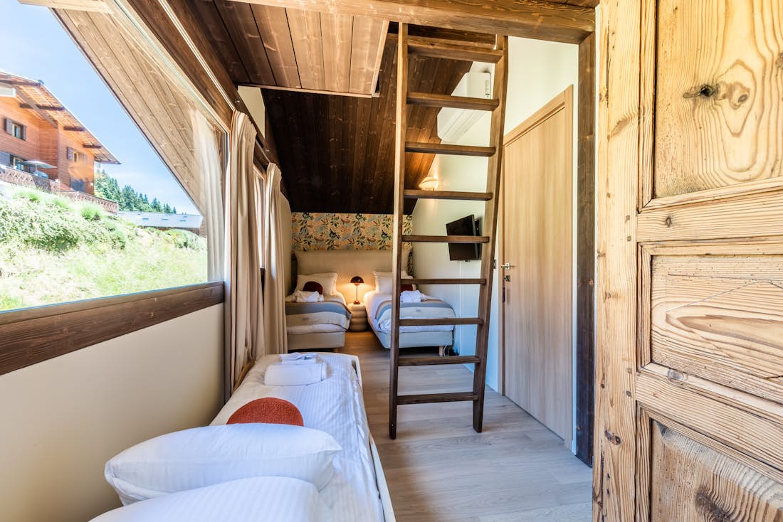 Morzine accommodation - Chalet Cipolin - Cosy double bedroom with landscape views at ski chalet Cipolin La Cote d'Arbroz
