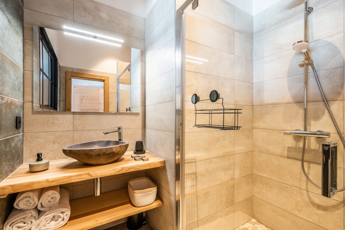 Contemporary designed bathroom walk-in shower family Chalet Azobe Morzine