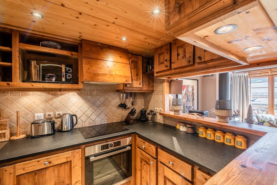 Wooden style kitchen family apartment Garapa Morzine