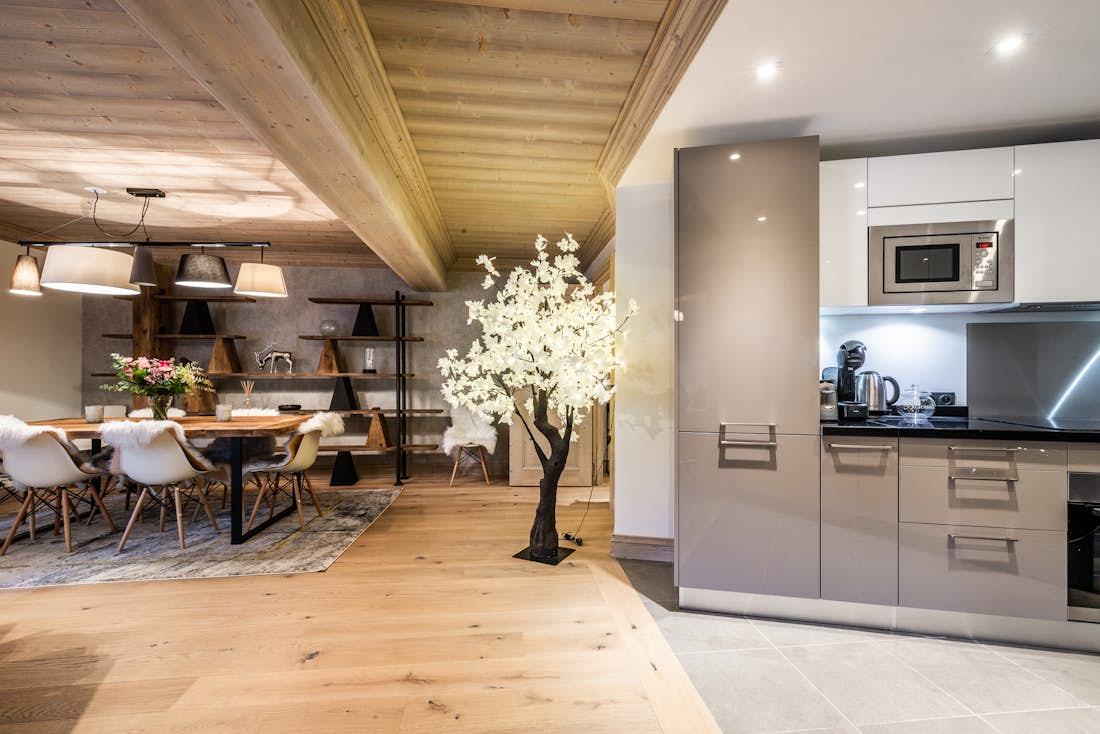 Modern open plan kitchen luxury ski in ski out apartment Padouk Courchevel Moriond