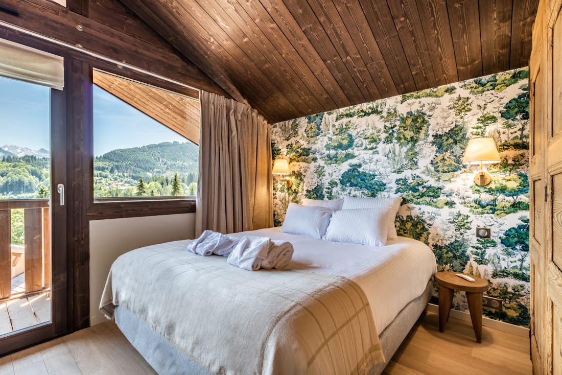 Cosy double bedroom landscape views ski chalet Cipolin La Cote d'Arbroz