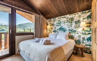 Morzine accommodation - Chalet Cipolin - Cosy double bedroom landscape views ski chalet Cipolin La Cote d'Arbroz