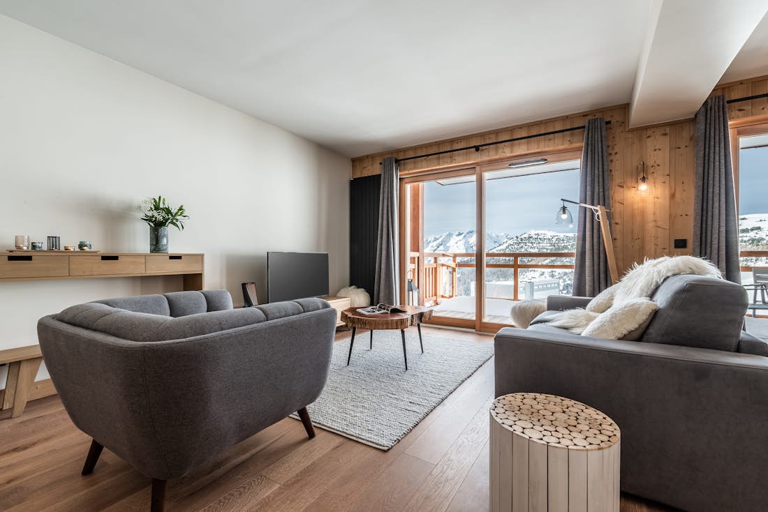 Alpe d’Huez location - Appartement Fagus - Un salon moderne dans appartement de luxe Fagus aux pieds des pistes à Alpe d'Huez