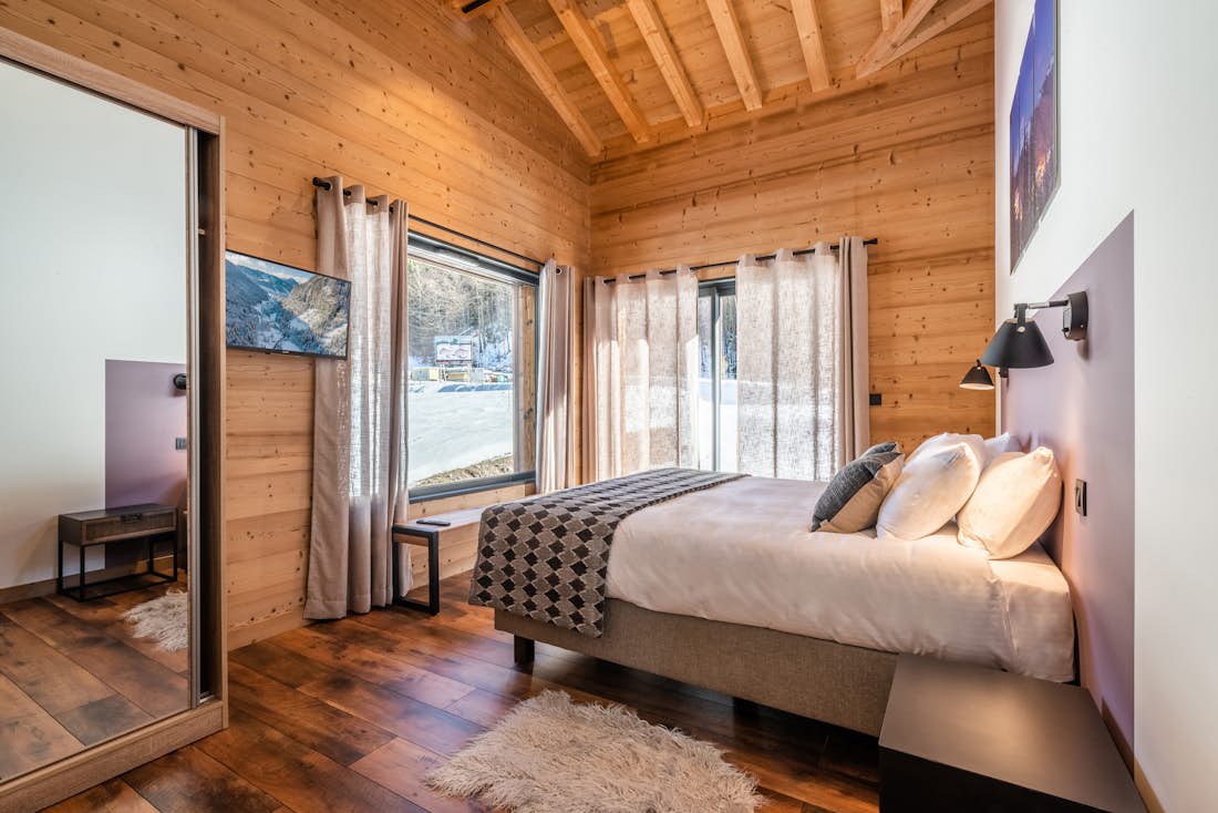 Morzine accommodation - Chalet Azobe - Modern double ensuite bedroom with outdoor views at family Chalet Azobe Morzine