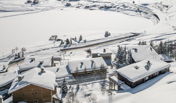 An aerial view of a snow covered village