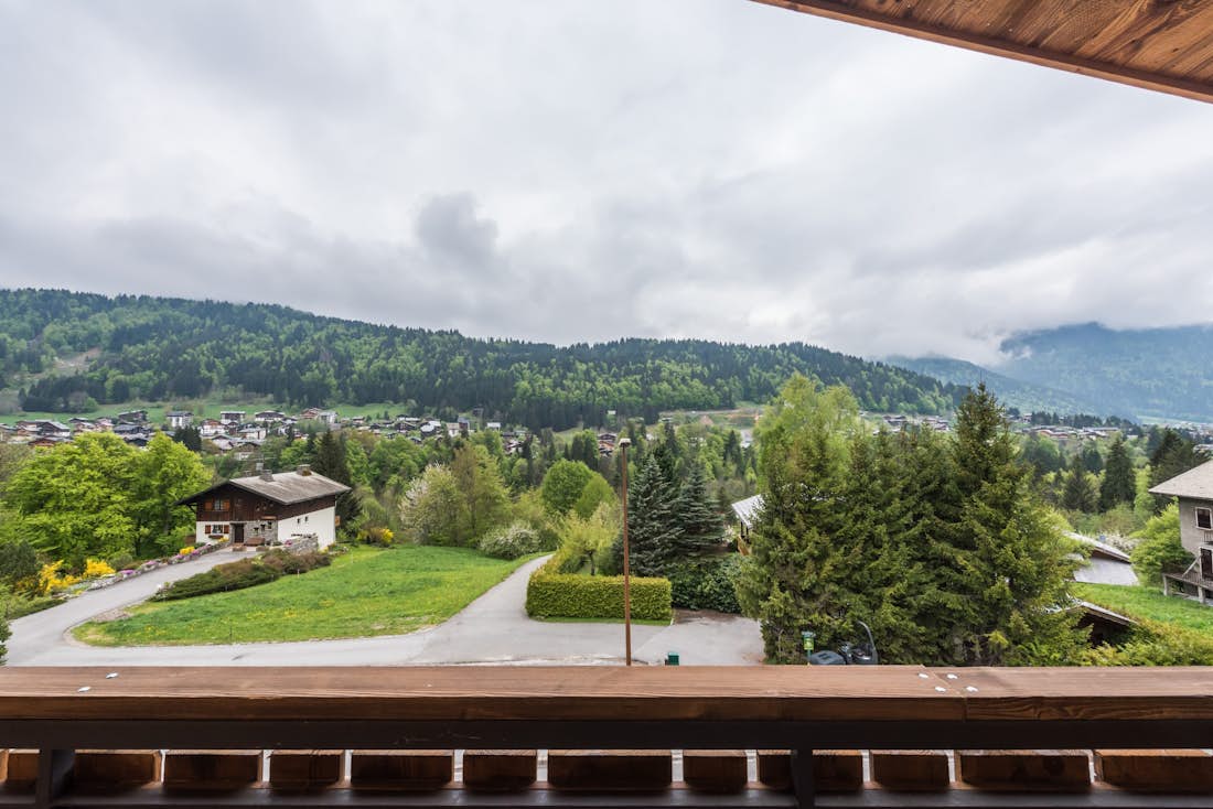 Wooden terrace mountain views Alps luxury ski apartment Agba Morzine