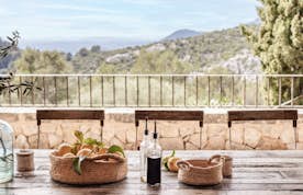 Mallorca accommodation - Can Tramuntana - A stone patio with a table and chairs.