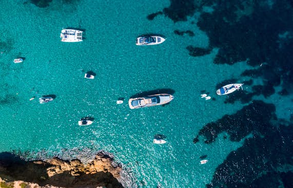 An aerial view of a group of boats in the water