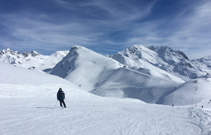 Skiing down a snow covered slope