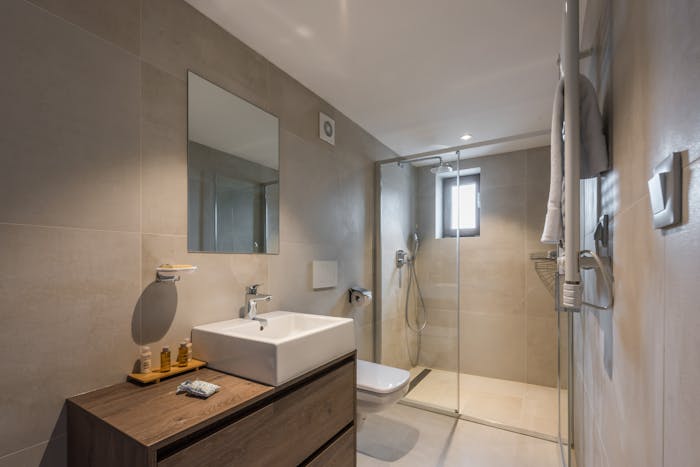Modern bathroom walk-in shower ski apartment Sugi Morzine