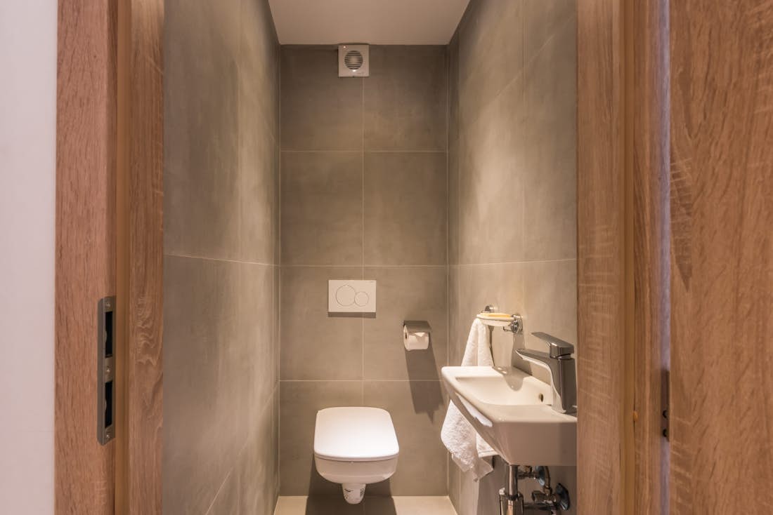 Grey toilet room of Iroko accommodation in Morzine