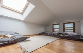 Morzine accommodation - Apartment Agba - Playroom with grey Fat Boy pillows at the luxury family apartment Agba in Morzine Morzine accommodation - Apartment Agba - Playroom grey Fat Boy pillows luxury family apartment Agba Morzine