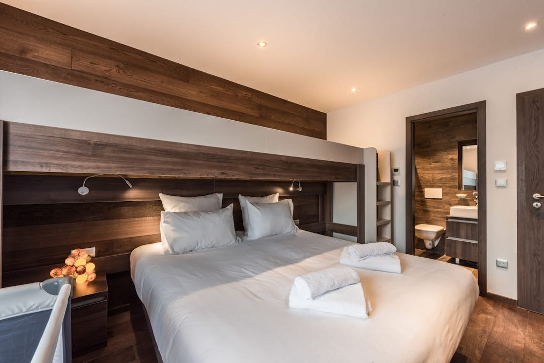 Morzine accommodation - Apartment Catalpa - Design double bedroom with ample cupboard space and landscape views at ski apartment Catalpa in Morzine