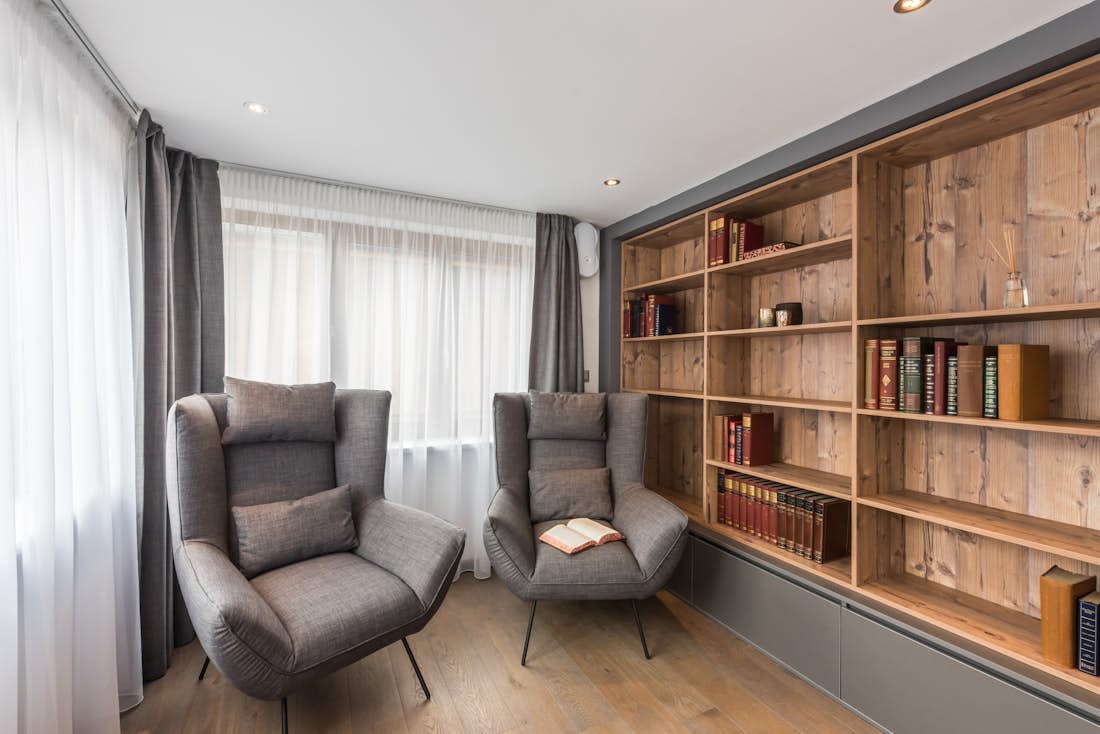 Grey armchairs spacious living room luxury ski apartment Ayan Morzine