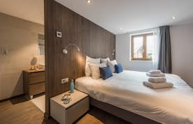 Morzine location - Appartement Sugi - Chambre double chaleureuse salle de bain privée appartement familial Sugi Morzine