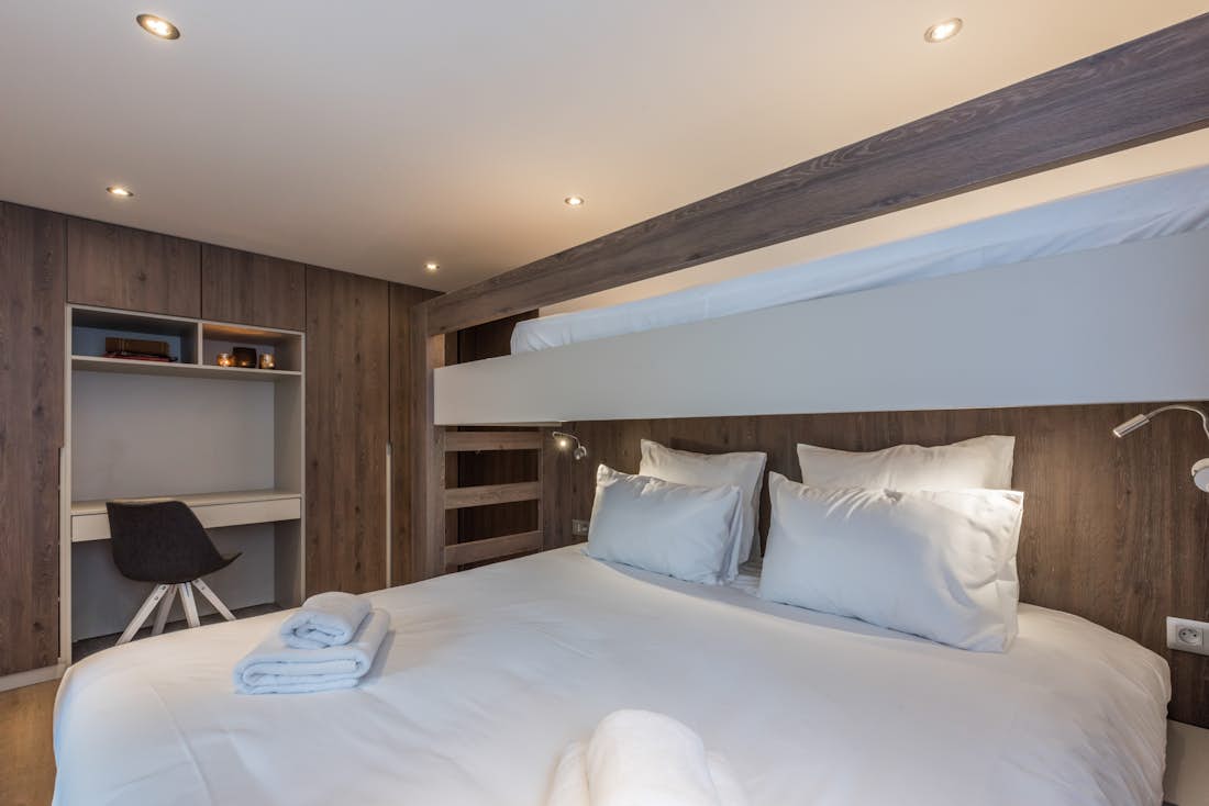 Morzine accommodation - Apartment Sugi - Luxury double ensuite bedroom with mezzanine and private bathroom at hotel services apartment Sugi in Morzine