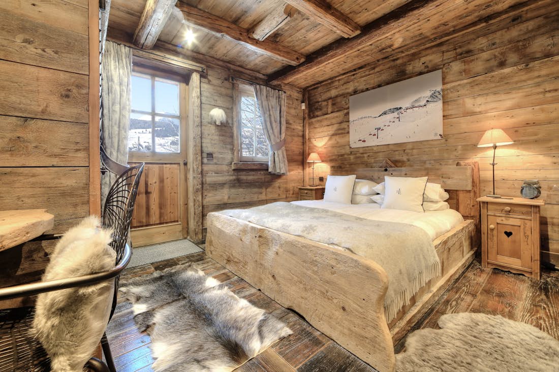 Megeve accommodation - Chalet Zebrano - Cosy double bedroom with landscape views at family Chalet Zebrano Megeve