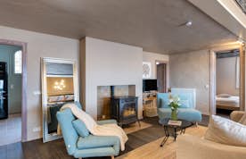Costa Brava accommodation - La Capella - A living room with a fireplace.