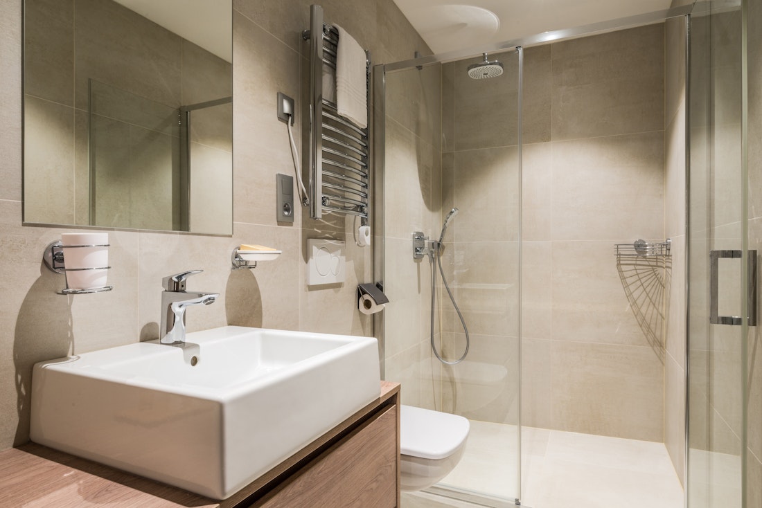 Modern bathroom walk-in shower family apartment Kauri Morzine