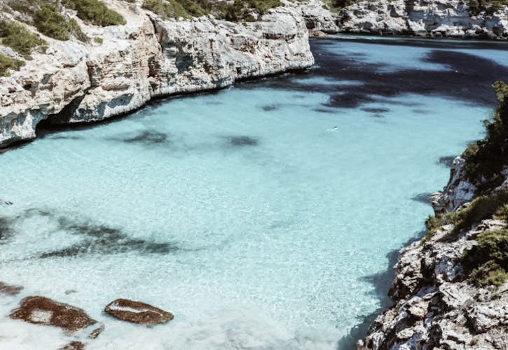 A body of water near the rocky coast of Majorca