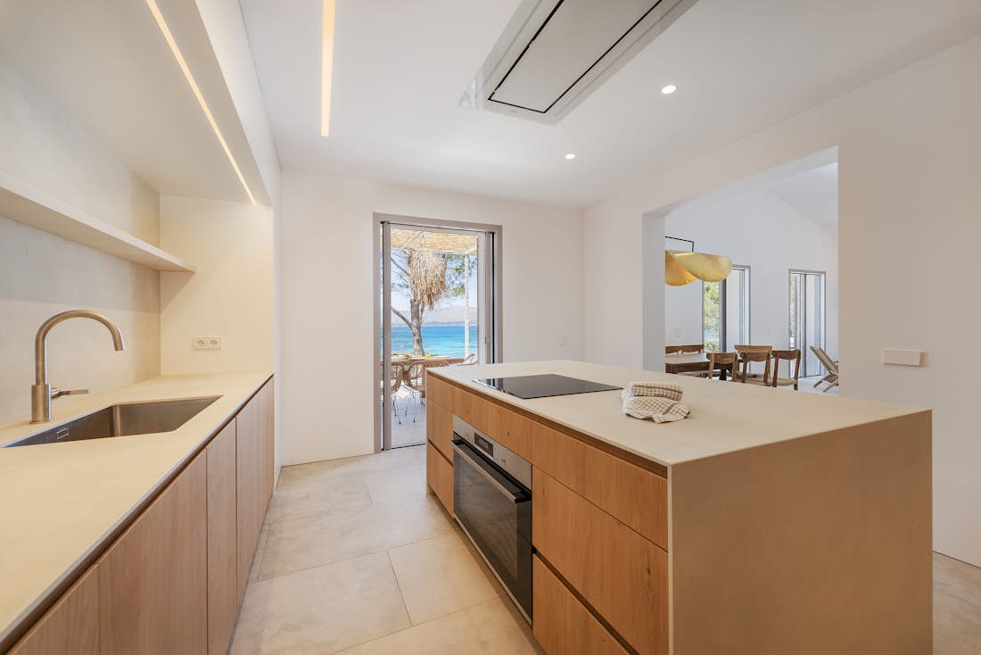 Contemporary designed kitchen in sea view villa Barcares in Mallorca