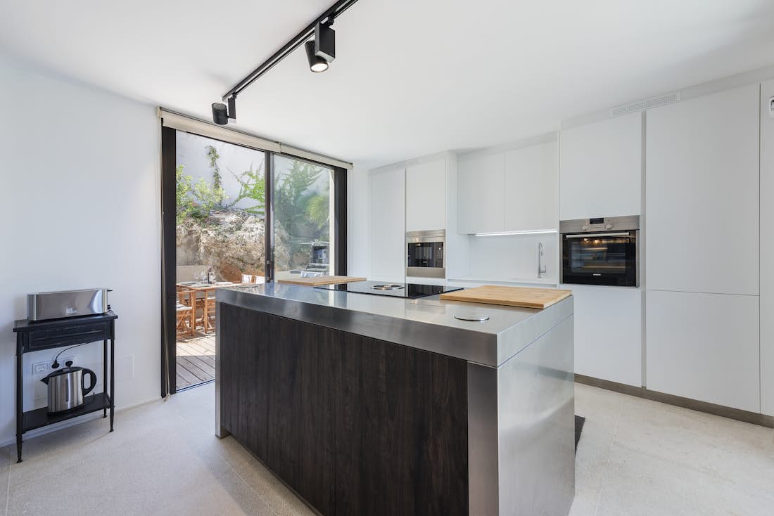 Mallorca accommodation - Villa Seablue - Contemporary designed kitchen in mediterranean view villa Seablue in Mallorca