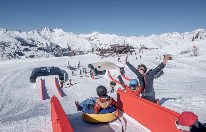 Children playing in the the Apocalypse Park snowpark in Les Arcs