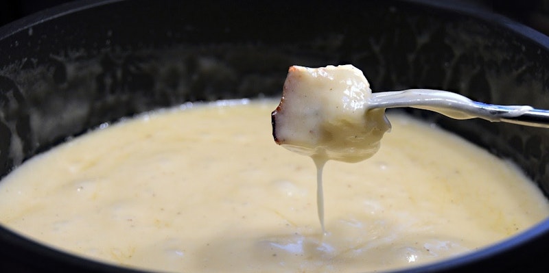 Cheese fondue ate during ski holiday in French Alps