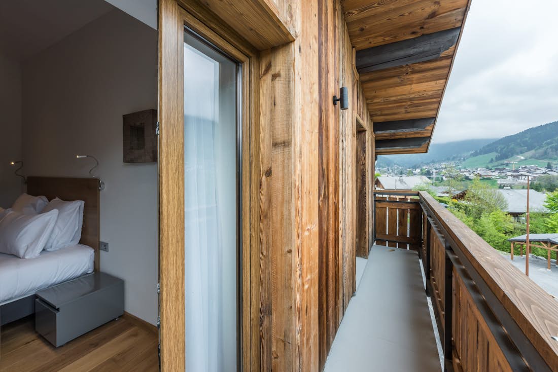 Wooden terrace mountain views Alps luxury family apartment Agba Morzine